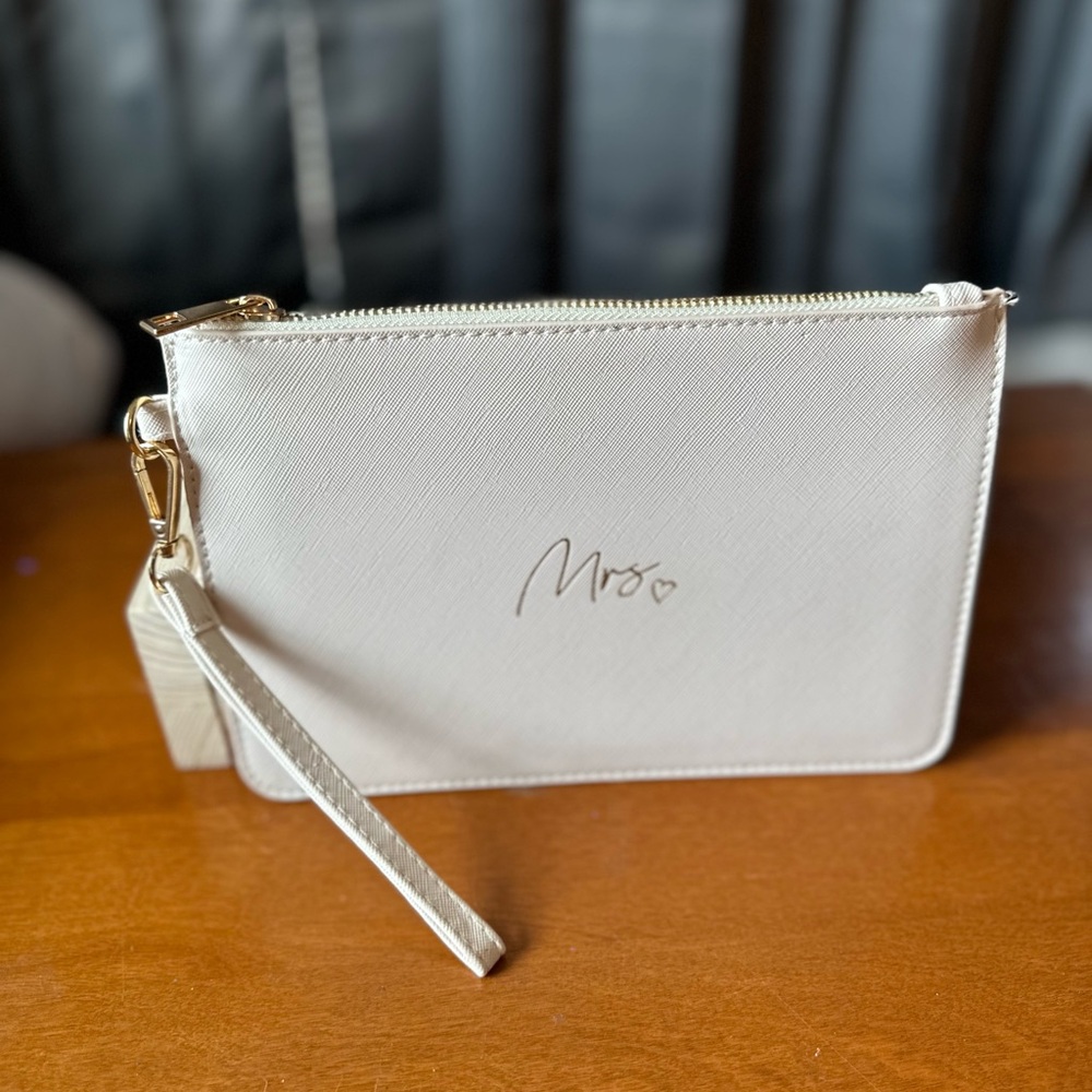 Cream Leather Wristlet with Gold Accents